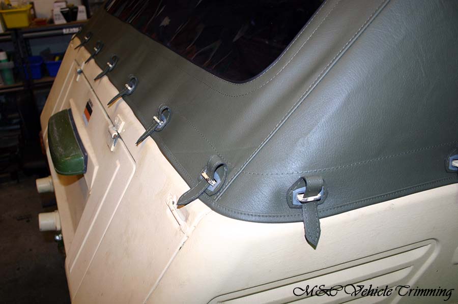 M&C Vehicle Trimming - Rectangular slotted eyelets with disc M&C Vehicle Trimming - Rectangular slotted eyelets with disc
